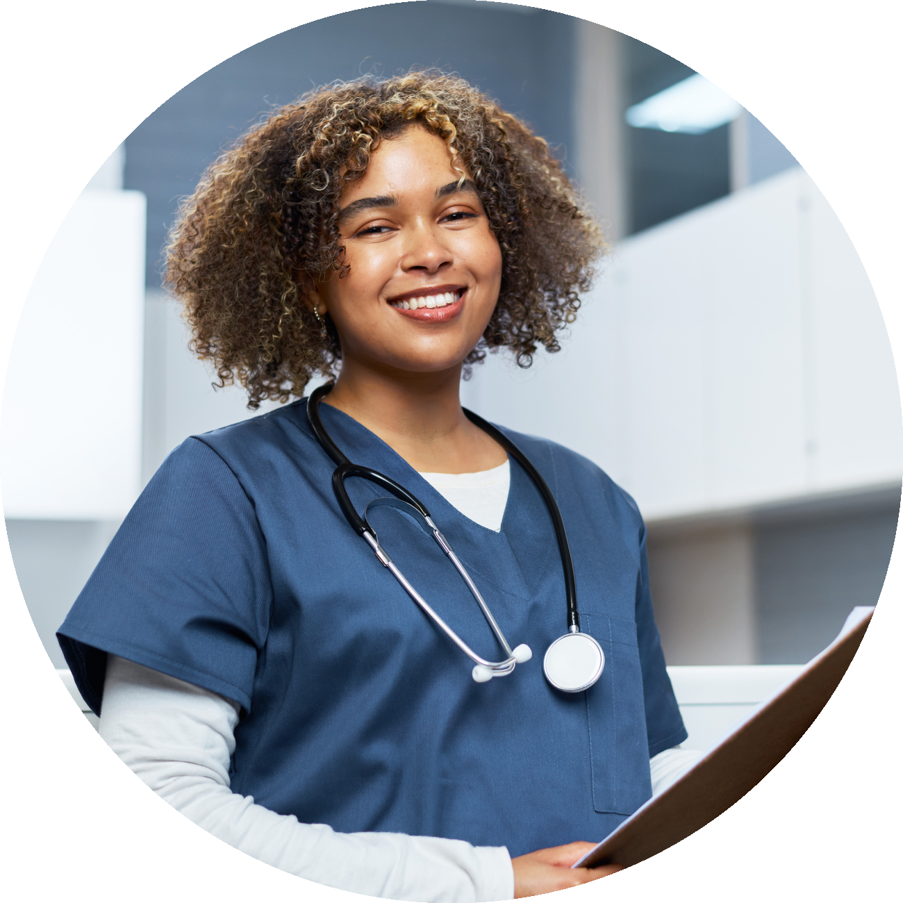 female physician assistant smiling at work.